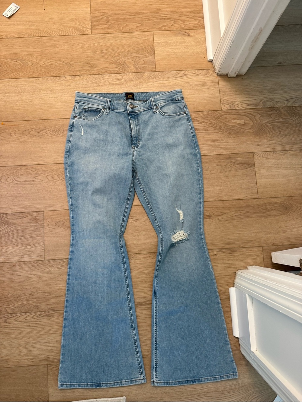 Lee Light Blue High-Rise Flare Jeans with Distressed Knee